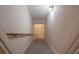 View of a carpeted stairway leading to a lower level at 1551 Pharrs Rd., Snellville, GA 30078