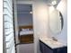 Modern bathroom featuring a vessel sink, luxury fixtures, and a view to a bedroom at 2015 Shaudi Ln, Atlanta, GA 30345