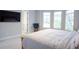 Bright bedroom with large windows, featuring a comfortable bed and ample natural light at 2015 Shaudi Ln, Atlanta, GA 30345