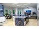 Spacious kitchen with granite island, modern appliances, dining area, and open floor plan at 2015 Shaudi Ln, Atlanta, GA 30345