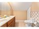 Bathroom featuring double vanity, toilet, tile floors, and neutral decor at 2949 Lake Spivey Pkwy, Jonesboro, GA 30236