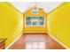 Bedroom with vaulted ceiling, unique wall paint, window, and ceiling fan at 2949 Lake Spivey Pkwy, Jonesboro, GA 30236