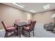 Finished basement space with carpet, soft lighting, and a classic game table for entertaining at 3635 Norwich Dr, Tucker, GA 30084