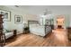 Spacious bedroom featuring hardwood floors, neutral decor, and a comfortable bed at 3635 Norwich Dr, Tucker, GA 30084
