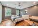 Stylish bedroom with hardwood floors, ample natural light, and modern decor at 3635 Norwich Dr, Tucker, GA 30084
