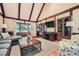 Cozy living room with vaulted ceilings, exposed wood beams, and comfortable seating at 3635 Norwich Dr, Tucker, GA 30084