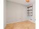 Cozy room featuring tile floors and shelves at 5250 Aubrey Ln, Cumming, GA 30028