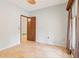 Bright bedroom with tan tile flooring and neutral paint colors at 5250 Aubrey Ln, Cumming, GA 30028