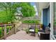 Relaxing back deck with comfortable seating overlooking lush greenery, great for outdoor enjoyment at 933 N Highland Ne Ave, Atlanta, GA 30306