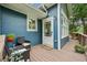 Inviting back porch with comfortable seating, perfect for relaxing and enjoying the outdoors at 933 N Highland Ne Ave, Atlanta, GA 30306