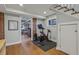 Basement gym area with exercise equipment and hardwood floors at 933 N Highland Ne Ave, Atlanta, GA 30306