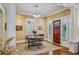 Bright foyer featuring hardwood floors, a chandelier, and natural light at 933 N Highland Ne Ave, Atlanta, GA 30306