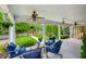 Relaxing front porch with comfortable seating and a view of the manicured front yard at 933 N Highland Ne Ave, Atlanta, GA 30306