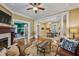 Open-concept living room featuring a fireplace, hardwood floors, and neutral decor at 933 N Highland Ne Ave, Atlanta, GA 30306