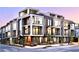 Modern townhome showcases sleek design with large windows, balconies, and contemporary architectural details in urban setting at 105 Georgia Se Ave # 7, Atlanta, GA 30312