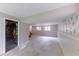 Unfinished basement offering potential living space with stairs and two windows for natural light at 1060 S Millard Way, Stone Mountain, GA 30088