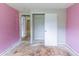 Bedroom featuring closet and entrance to hall and main bedroom at 1060 S Millard Way, Stone Mountain, GA 30088