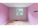 Bedroom with a window overlooking the backyard at 1060 S Millard Way, Stone Mountain, GA 30088