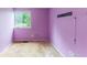 Bedroom with a window overlooking the backyard at 1060 S Millard Way, Stone Mountain, GA 30088