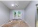 Empty dining room with french doors opening up to a deck at 1060 S Millard Way, Stone Mountain, GA 30088