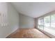 Empty living room with a large window at 1060 S Millard Way, Stone Mountain, GA 30088