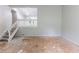 Empty living room with stairs and a view of a deck at 1060 S Millard Way, Stone Mountain, GA 30088