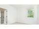 Bright bedroom features a window letting in natural light and neutral carpet at 1510 Gatekeeper Ter, Marietta, GA 30066