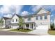 Street view of new construction homes with charming exteriors, garages, and manicured lawns at 1510 Gatekeeper Ter, Marietta, GA 30066