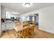Open floor plan with updated kitchen featuring stainless steel appliances and a breakfast bar overlooking the living room at 1773 Kimberly Sw Dr, Marietta, GA 30008