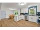 Open concept kitchen with granite countertops, island, stainless steel appliances, and dining area at 1773 Kimberly Sw Dr, Marietta, GA 30008