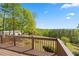 A wood deck overlooking a private, wooded backyard at 922 Florence Rd, Douglasville, GA 30134