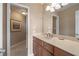 Bathroom featuring a spacious countertop, vanity, and tiled floors at 922 Florence Rd, Douglasville, GA 30134