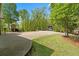 Long driveway leading to a home with ample parking and lush landscaping at 922 Florence Rd, Douglasville, GA 30134