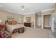 Spacious main bedroom with fireplace, sitting area, and large windows overlooking the backyard at 922 Florence Rd, Douglasville, GA 30134