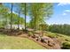 Spacious outbuilding on a well-manicured lot with mature trees and landscaping at 922 Florence Rd, Douglasville, GA 30134