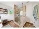Primary bathroom with a glass enclosed tiled shower and tiled flooring at 1039 Avery Creek Dr, Woodstock, GA 30188