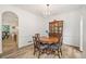 Cozy dining room with hardwood floors, chandelier, and elegant china cabinet for sophisticated meals at 1039 Avery Creek Dr, Woodstock, GA 30188