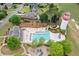 Aerial view of a neighborhood pool, with a slide, splash pad, and silo water tower features at 1039 Avery Creek Dr, Woodstock, GA 30188
