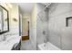 Renovated bathroom features tiled shower, modern fixtures, and stylish design at 1492 Frazier Rd, Decatur, GA 30033
