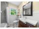 Classic bathroom with stylish vanity, tub, and ladder shelf at 1492 Frazier Rd, Decatur, GA 30033