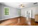 Expansive bedroom featuring beautiful hardwood floors and natural light from large windows at 1492 Frazier Rd, Decatur, GA 30033