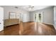 Airy bedroom featuring hardwood floors, large windows, a ceiling fan, and a sliding glass door at 1492 Frazier Rd, Decatur, GA 30033