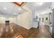 Open living area and kitchen featuring hardwood floors and white cabinetry at 1492 Frazier Rd, Decatur, GA 30033