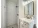Updated bathroom with a walk-in shower, subway tile, stylish vanity, and modern fixtures at 2685 Harrington Dr, Decatur, GA 30033