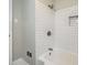 Clean bathroom featuring white subway tile shower and new fixtures at 2685 Harrington Dr, Decatur, GA 30033