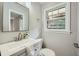 Cozy bathroom with a sleek vanity, soft lighting, and a large window providing natural light at 2685 Harrington Dr, Decatur, GA 30033