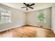 Cozy bedroom with dual windows, hardwood floors, and ceiling fan at 2685 Harrington Dr, Decatur, GA 30033