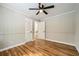 Spacious bedroom with ceiling fan and hardwood floors at 2685 Harrington Dr, Decatur, GA 30033