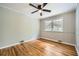 Bright bedroom with wood floors, ceiling fan, and window view at 2685 Harrington Dr, Decatur, GA 30033