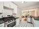 Modern kitchen with stainless steel appliances and a seamless view of the dining area at 2685 Harrington Dr, Decatur, GA 30033